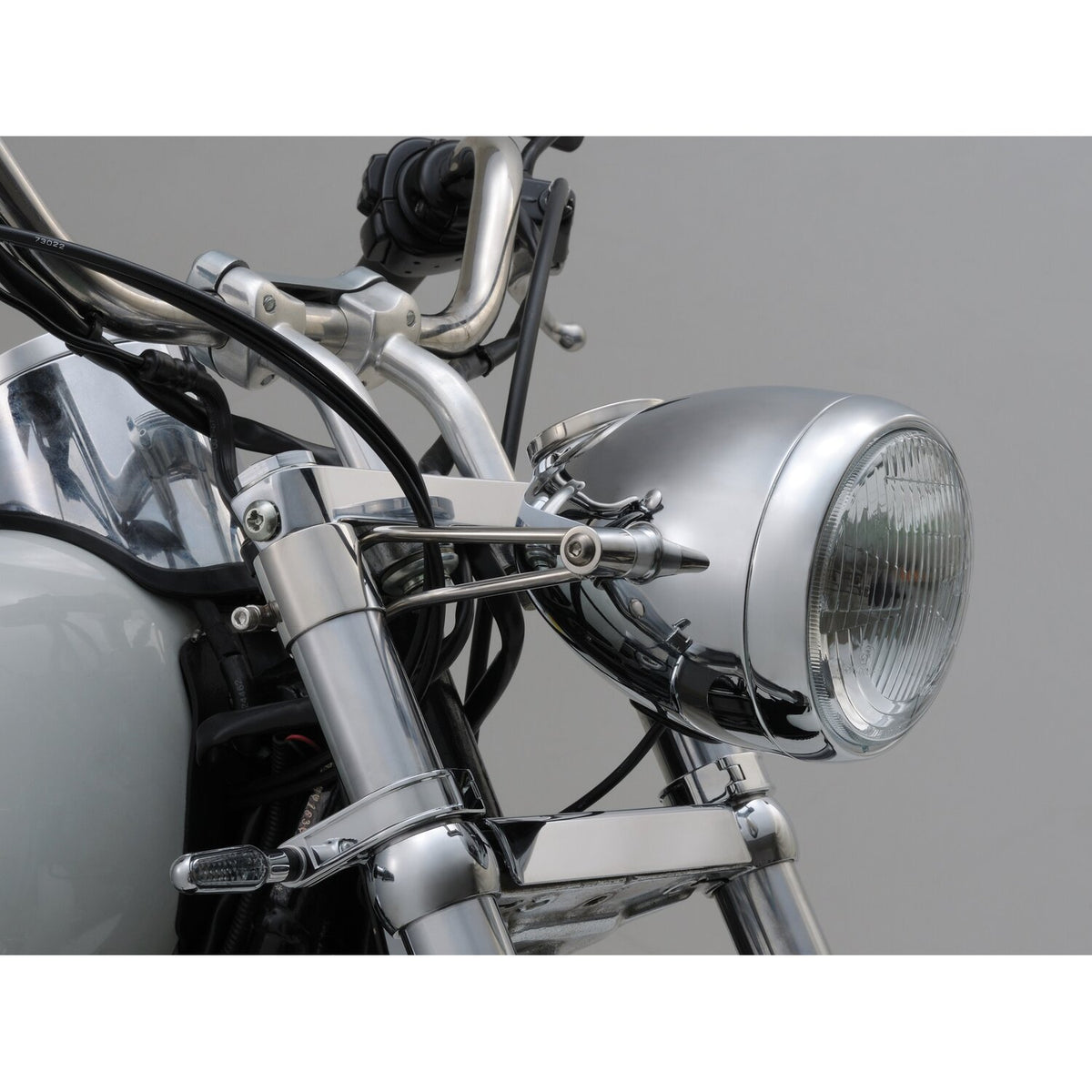 Bracket for 'vintage' headlamp. 41mm fork tubes. Polished ss