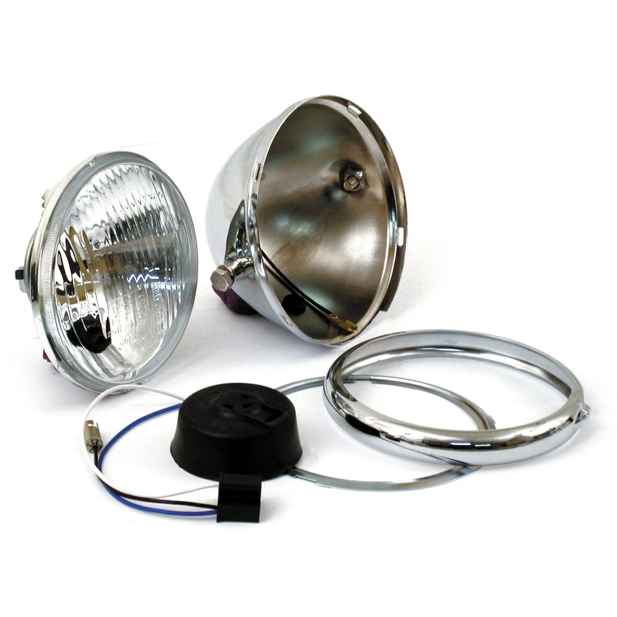 Bates style 5-3/4" H4 headlamp. side mount. Chrome