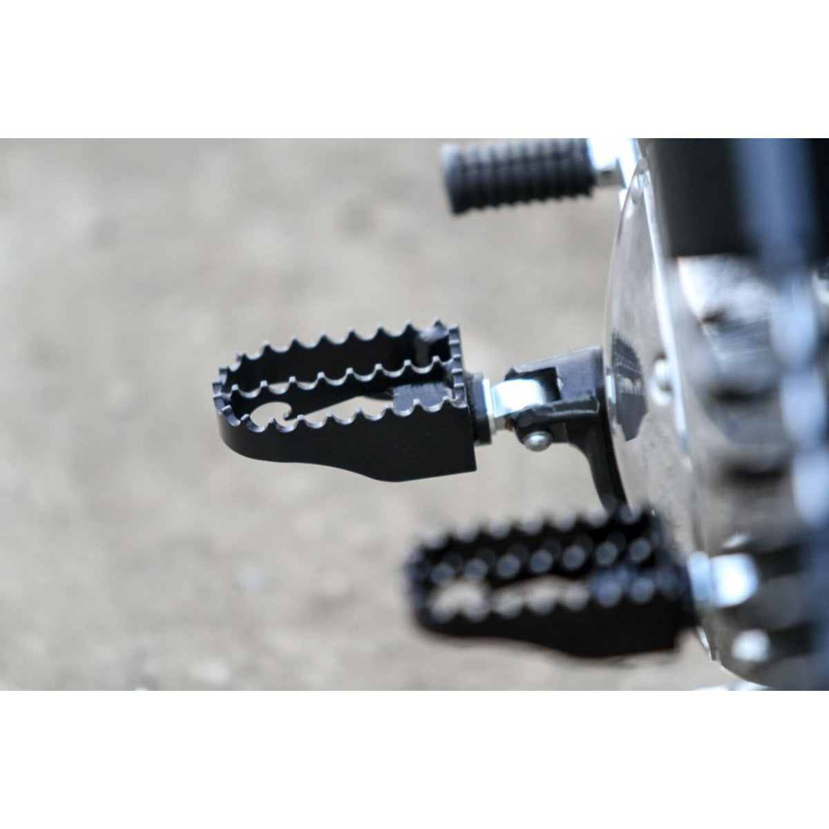 Burly, MX foot pegs. Black