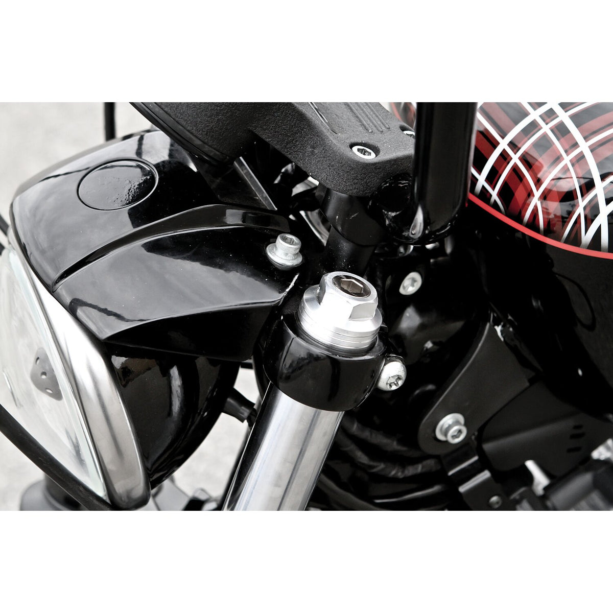 Burly, 39mm fork spring preload adjusters. Clear anodized