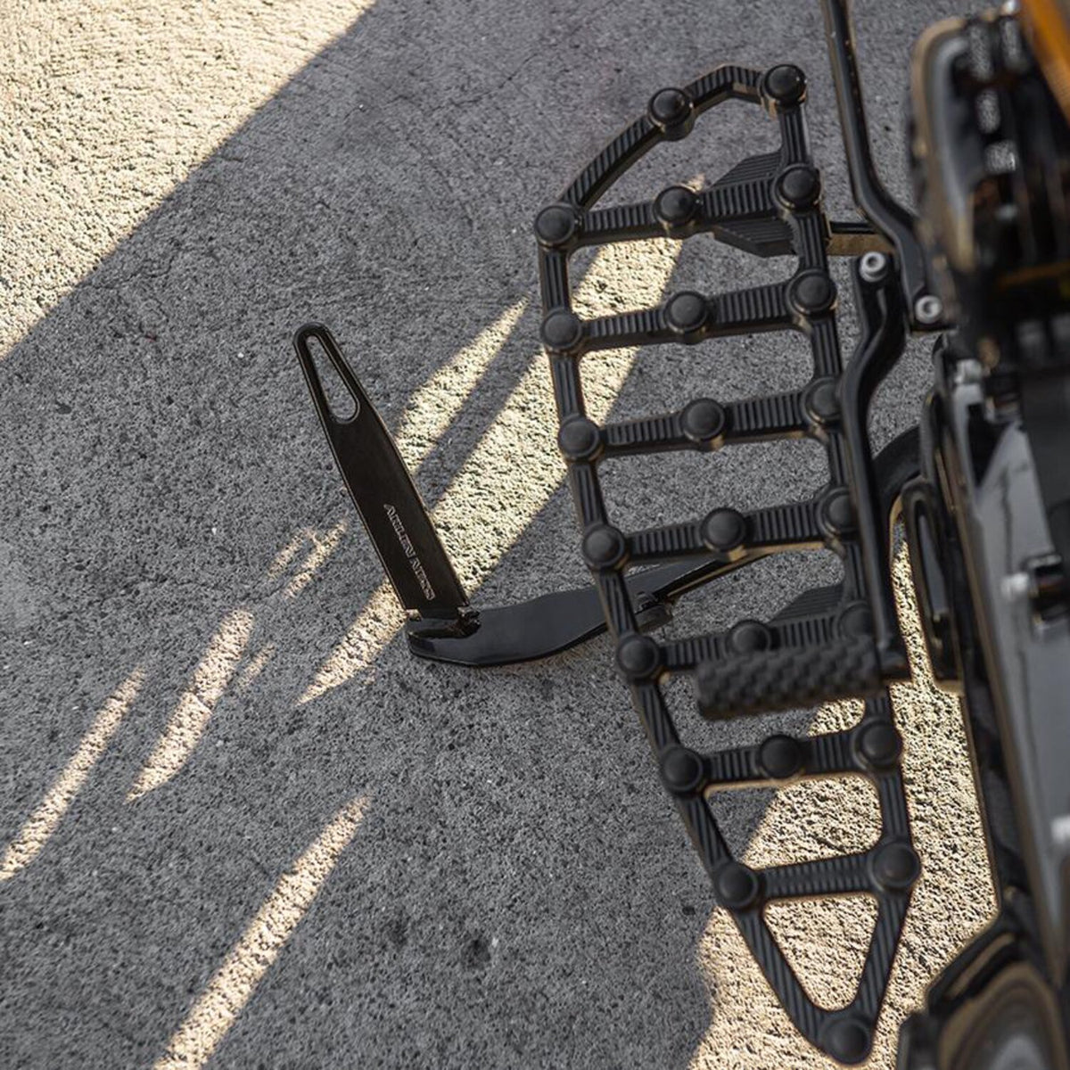 Arlen Ness, bagger kickstand tab extension. Black