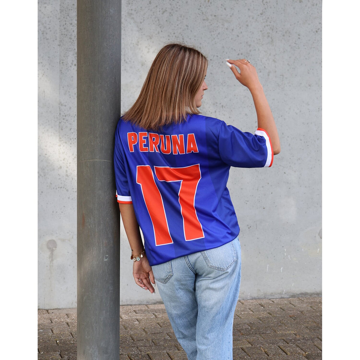 Roeg Peruna LE football jersey blue/orange