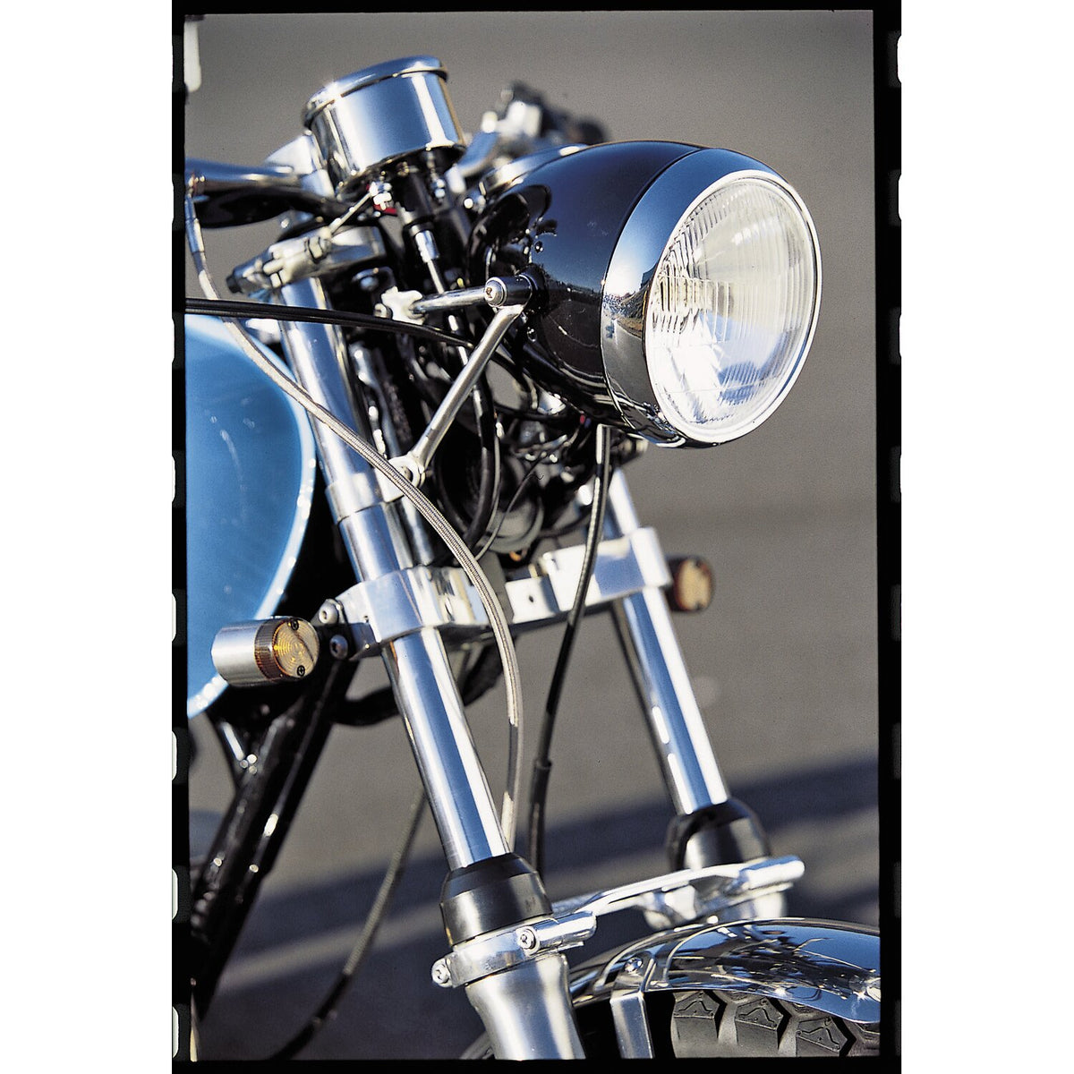 Daytona, Vintage 5-3/4" headlamp. Black with chrome ring