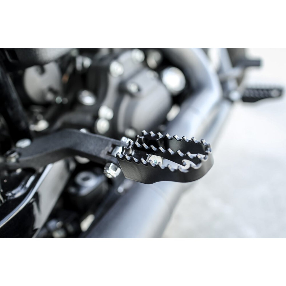 Burly, Mini MX style foot pegs. Black