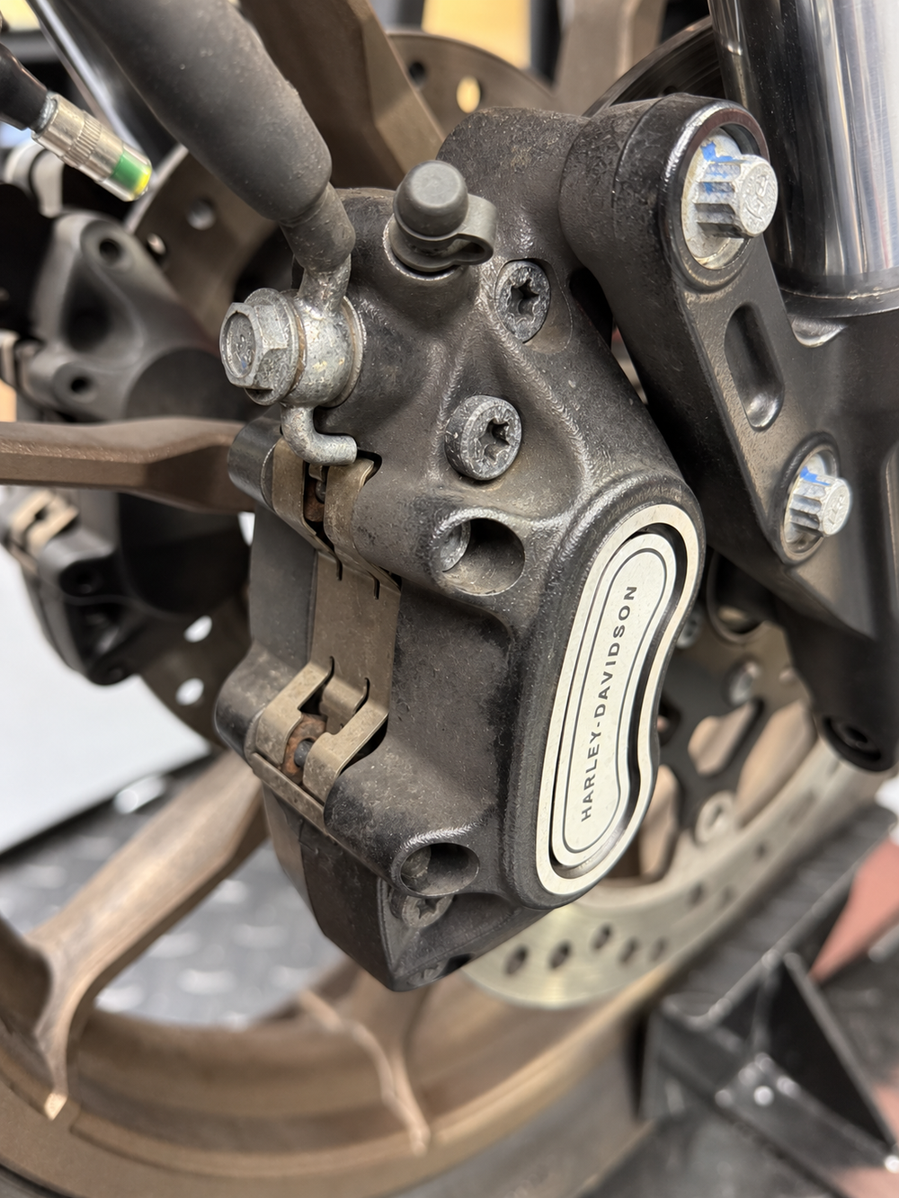 Harley Davidson brake caliper before dry ice blasting