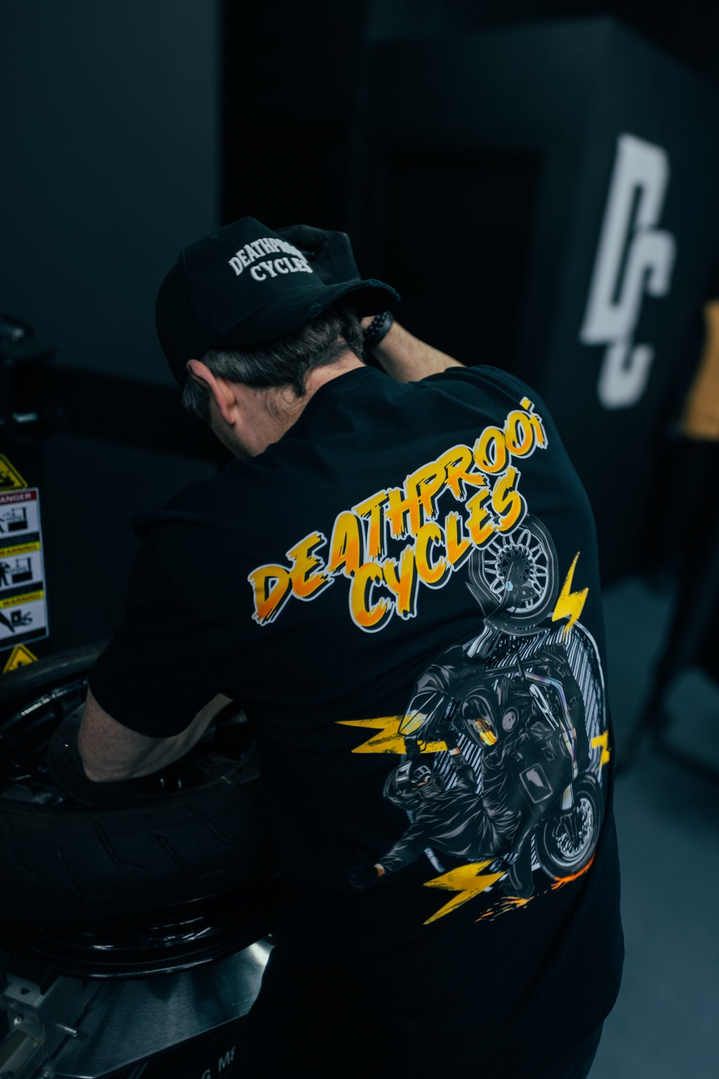 Deathproof Cycles graphic T-shirt in the workshop