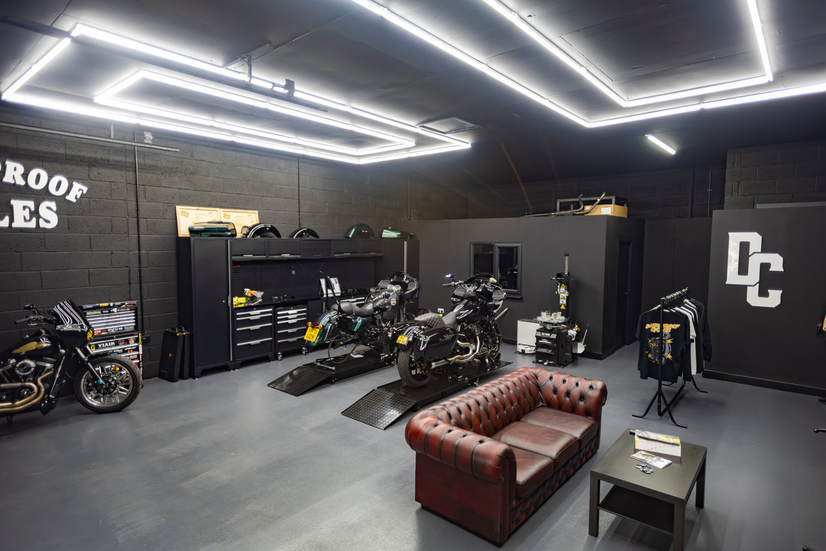 Motorcycles and workbenches inside Deathproof Cycles